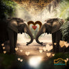 2 elephants  trunks form a heart